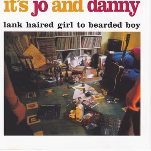 Lank haired girl to bearede boy